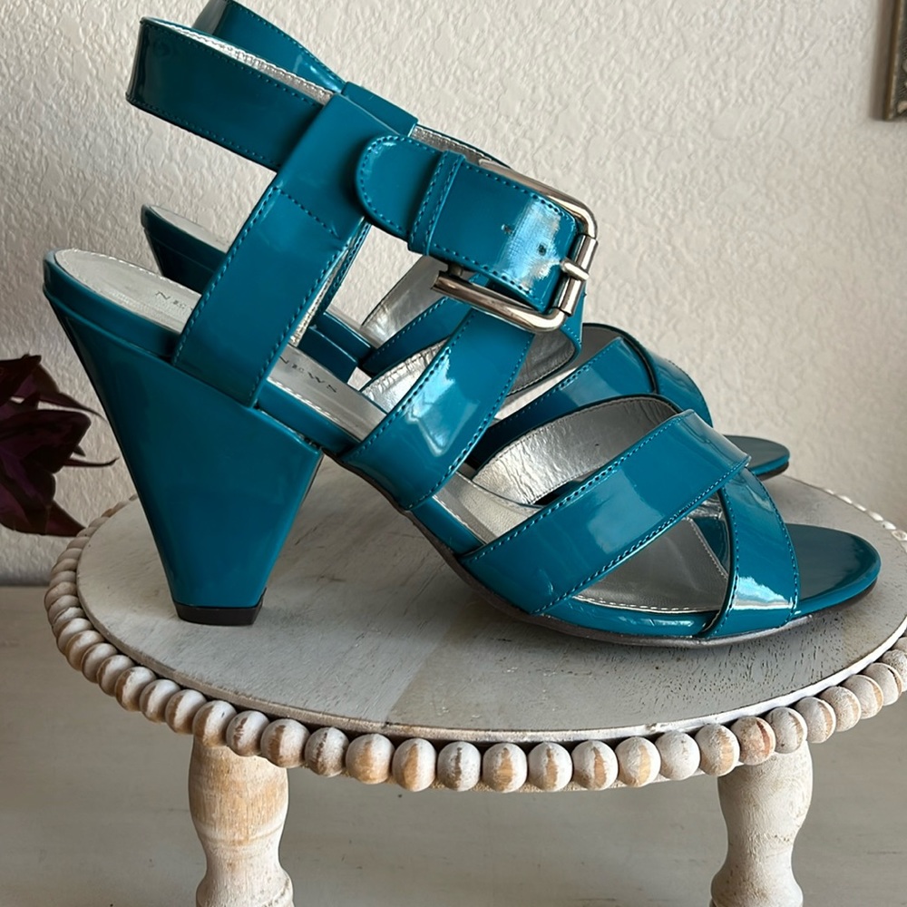 Newport News teal patent ankle cross strap heel